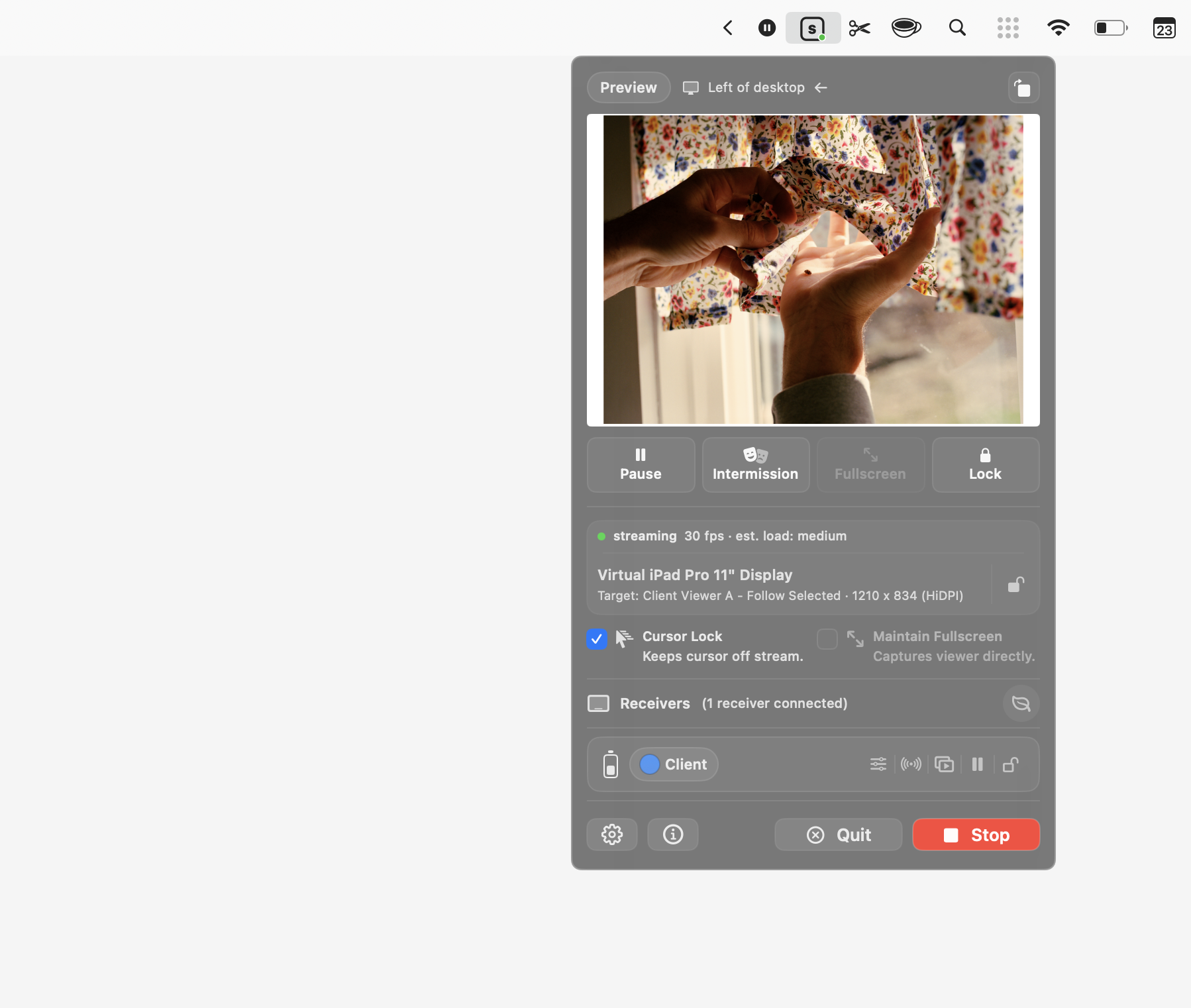 OneScreen for Mac menu bar preview with desktop context, streaming controls, and receiver status.